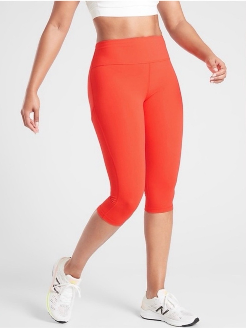 Athleta ultimate stash pocket crop Capri leggings neon coral pink size small
